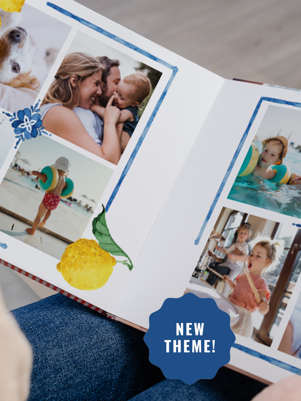 Open photobook with photos of children playing in the ocean