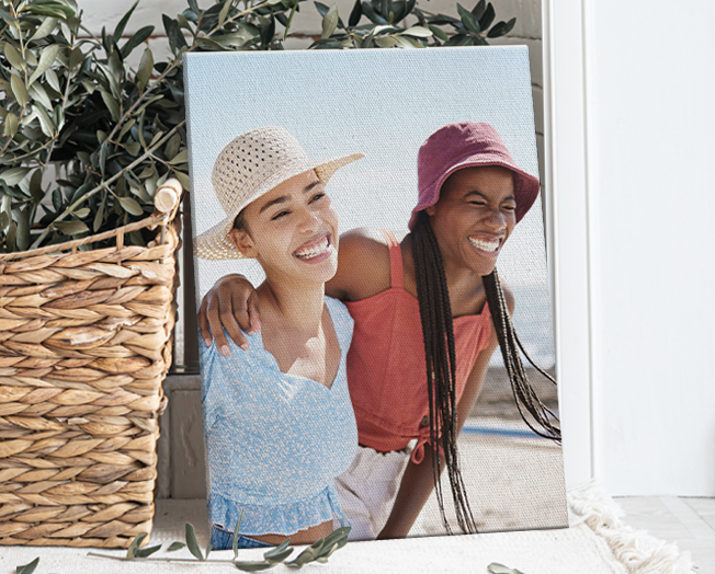 Framed wooden print against a wall with a parent and baby with the text 'That Forever Kind of Love'