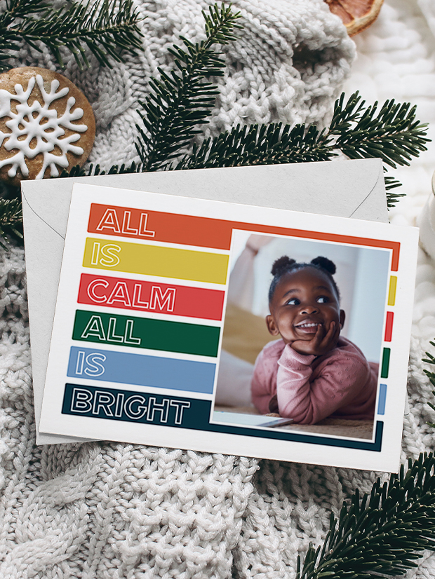 Card dispalyed in a wicker basket with a cup of coffe and flowers, the card has a couple on their wedding day with the text 'Thank You' underneath